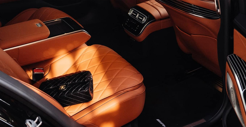Immaculate tan leather cabin interior of a luxury Mercedes